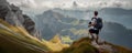 Solo hiker admiring the view on top of a mountain. French Alps view of the Col des Aravis - tourism and vacation - Pointe de