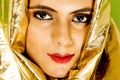 Beautiful Indian woman in golden headgear