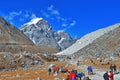 Group of hikers with backpacks on the trek in Himalayas, trip to the base camp Everest