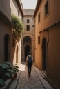 A solo traveler wandering through a maze of narrow alleyways in a historic city, with ancient architecture and hidden courtyards