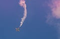 Plane jet soloist at the italian tricolor arrows air show performs the acrobatic figure `dead leaf`