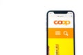 SOLOTHURN, SWITZERLAND - NOVEMBER 11, 2018: Coop logo displayed on a modern smartphone