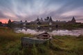 Solovki Island, Russia. Classic Scenic View Of The Solovetsky Spaso-Preobrazhensky Transfiguration Monastery And The Big Old Boat