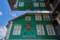 Part of the colorful green facade of the toy museum in Soltau Germany