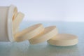 Soluble tablets falling out the plastic tube Royalty Free Stock Photo