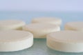 Soluble tablets on glass table top Royalty Free Stock Photo