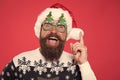 Solution concept. Santa is coming. Santa man wear christmas tree party glasses. Inspired face. Happy bearded man with Royalty Free Stock Photo