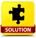 Solution (puzzle icon) yellow square button red ribbon in middle Royalty Free Stock Photo