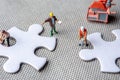 Solving problems fiting together of empty puzzle pieces Royalty Free Stock Photo