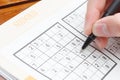 Solving sudoku Royalty Free Stock Photo