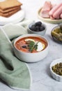 Solyanka, Russian soup with sausage, olives and capers Royalty Free Stock Photo