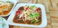 Som Tum Pu Pla Ra (Spicy Papaya Salad with Salted Crab and a pungent dressing based on fermented anchovy sauce) Royalty Free Stock Photo