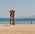 Soma Bay, Egypt - life guard tower at the beach with people in the water