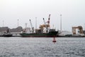 The Somaya general cargo ship docked alongside other vessels at Sultan Qaboos Port in Muscat, Oman Royalty Free Stock Photo