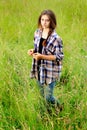 Somber Teen in Field