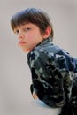 Somber Young Dark Haired Boy Royalty Free Stock Photo