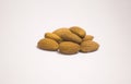 Some almonds on a white background