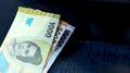 Some banknotes of Indonesian rupiah. Background from Indonesian rupiah Royalty Free Stock Photo