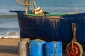 Some barrels full of fishing nets readies to be loaded on the boat