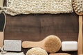 Some bath accessories on brown wooden background Royalty Free Stock Photo