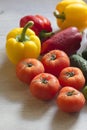 Some beautiful tomatoes lying on the kitchen table