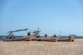 Some boats docked on the beach, blue sky, sea and beach Royalty Free Stock Photo