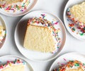 Some bread slices with colorful sprinkles on white plate Royalty Free Stock Photo