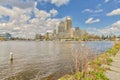 a view of a river with buildings in the background Royalty Free Stock Photo