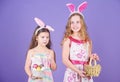 Some bunny loves you. Small girls in bunny headband for Easter celebration. Little girls wearing Easter bunny ears. Cute