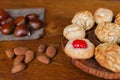 Some catalan panellets with almonds and roasted chesnuts. Typical desert in Catalonia in Halloween Called la Castanyada Royalty Free Stock Photo