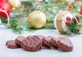 Some chocolate biscuit with christmas object as background