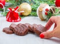 Some chocolate biscuit with christmas object as background