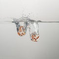 Clear game dice drop in clear water with a splash Royalty Free Stock Photo