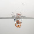 Clear game dice drop in clear water with a splash Royalty Free Stock Photo