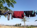 some clothes that are dried in the yard and become one of the uses of sunlight