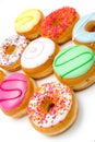 some colorful tasty donuts isolated