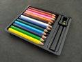 Some colorful wooden pencil isolated on black background