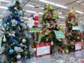 Some colourful christmas trees with decorations at a departmental store Royalty Free Stock Photo