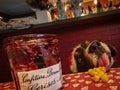 Some cute dog stealing food on a table Royalty Free Stock Photo