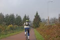 Some cyclists ride the park cycle path