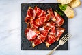 Top view of a some delicious pork bondiola fetas on a marble table