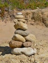 Mystical stone piles and figures on the beach in Albufeira, Algarve - Portugal