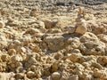 Mystical stone piles and figures on the beach in Albufeira, Algarve - Portugal