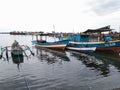 some fishing boats are docked in the fishing port Royalty Free Stock Photo