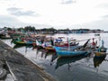 some fishing boats are docked in the fishing port Royalty Free Stock Photo