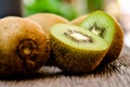 Some fresh Kiwi Fruits on an old wooden table Royalty Free Stock Photo