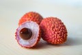 Some fresh lychees on a white cutting board Royalty Free Stock Photo
