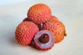 Some fresh lychees on a white cutting board Royalty Free Stock Photo