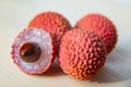 Some fresh lychees on a white cutting board Royalty Free Stock Photo