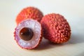 Some fresh lychees on a white cutting board Royalty Free Stock Photo